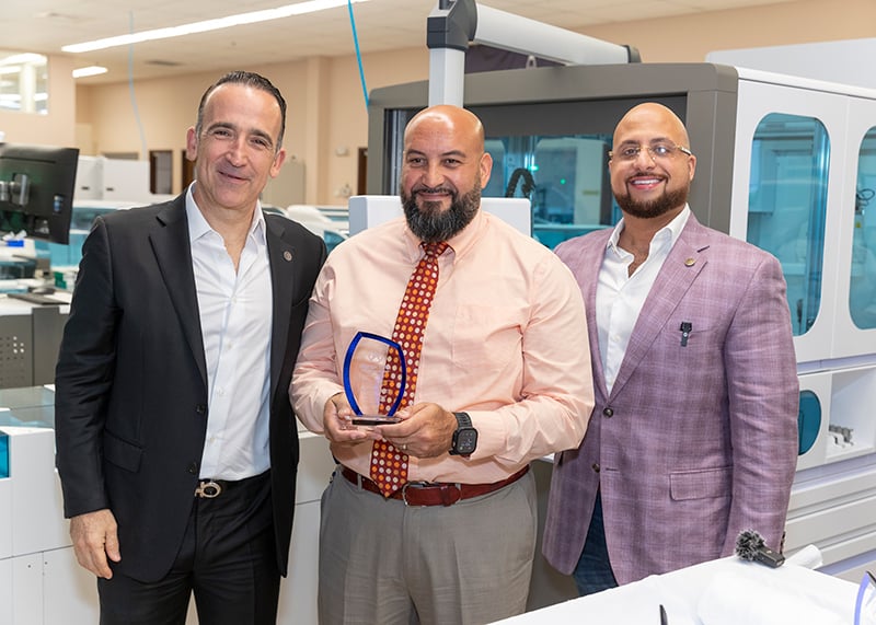 Left to right: Ernesto Lopez (Empresas Aries), Pablo Torres (Access Medical Labs IT Support Technician), Adam El-Hosseiny (COO of Access Medical Labs)